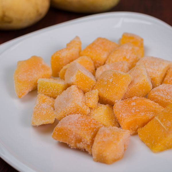 Frozen mango pieces