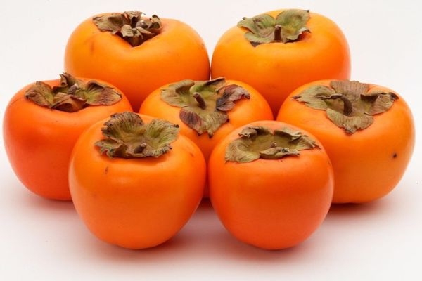 ‪Persimmons